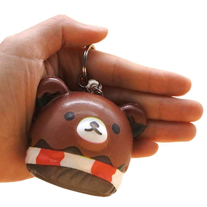 squishy tete ours dans la main